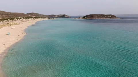 Turquoise sea water sunlit reflection, Elafonisos Island, Drone shot Stock Footage 339399391