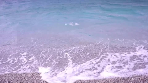 Turquoise sea waves on beach sand, Porto Germeno, Greece, seaside Stock Footage 263538168