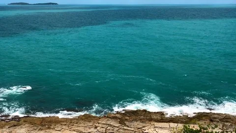 Turquoise Sea Waves Breaking at the Rocks, View from the Top Stock Footage 90867400