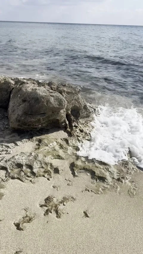 Turquoise Sea Waves Moving Around Rocks on Italian Mediterranean Coast. Video stock 342341293