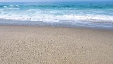 Turquoise sea waves on seashore 스톡 동영상 79640125
