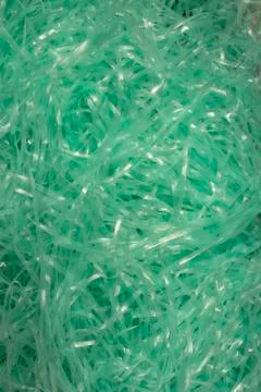 Turquoise shredded plastic fake Easter grass  Foto stock