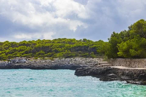 Turquoise water and cliffs bay Cal den Garrot Mallorca. Stock Photos