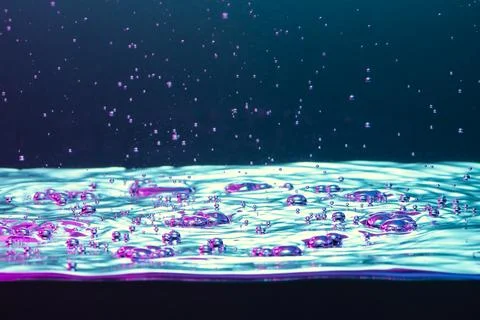 Turquoise water background with bubbles Stock Photos