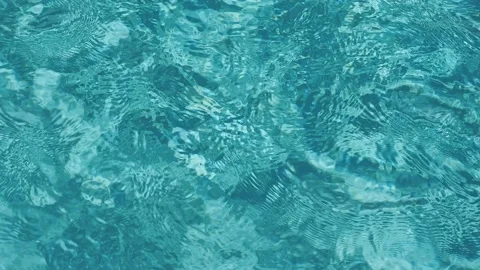 Turquoise water surface in a pool Stock Footage 132353947