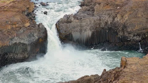 Turquoise waterfall Aldeyjarfoss dropping through a rugged canyon. Iceland Stock Footage 345164486