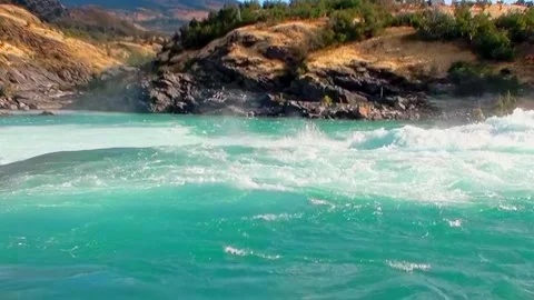 Turquoise Waters Rush Down Rugged Terrain of New Zealand Stock Footage 327014742