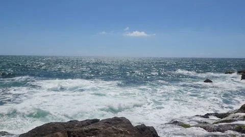 Turquoise Waves and White Sea Foam Crashing on Coastal Rocks Stock Footage 327227719