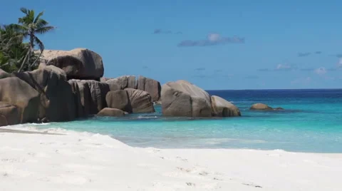 Turquoise waves flush tropical beach Stock Footage 49913775