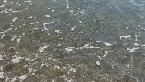 Turquoise waves roll over the beach. Stock Footage 145660022