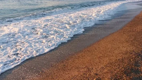 Turquoise waves roll over the beach Stock Footage 145662203