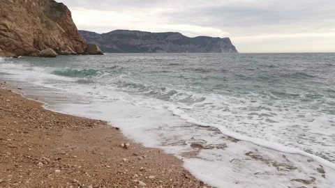 Turquoise waves roll over the beach Stock Footage 147734682