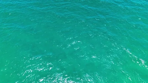 Turquoise wavy background of the Indian Ocean. Water or liquid texture. Stock Footage 311802602