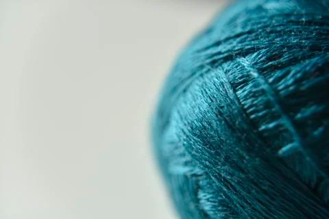 Turquoise wool ball on the white background Stock Photos