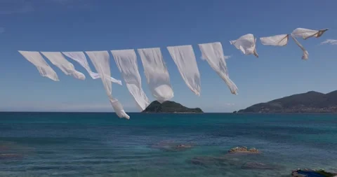 Turtle Island with waving white sheets Stock Footage 275594367