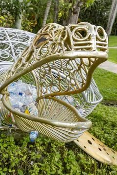 A turtle-shaped trash can that functions to collect plastic waste on the beac Stock-Fotos