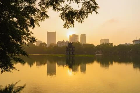 Turtle tower with modern skyscraper buildings and reflection in the middle of Stock Photos