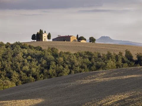 Tuscan field with barn in the background Stock Photos
