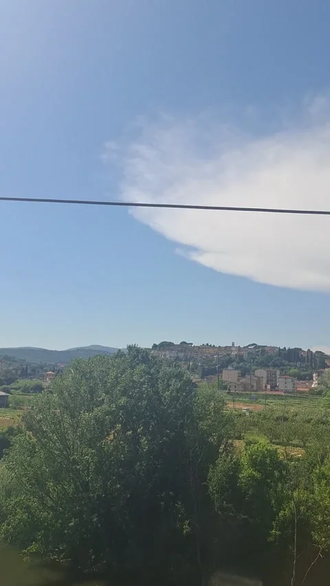 Tuscan landscape with the Arno River and hills seen from a train window Stock Footage 344685386