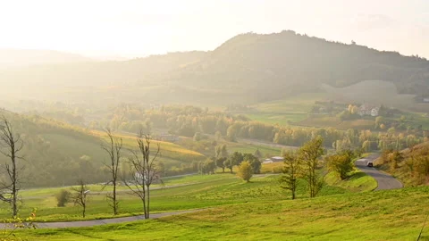 Tuscany hills in the rays of the setting sun. Beautiful panorama of the North of Stock Footage 155453526