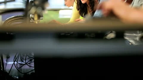 Tutor and young people using computers online education  Vidéo 10897097