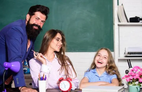 Tutor for excellence. Extra classes. Gifted child. Little girl studying with Stock Photos