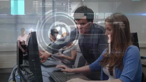 Tutor leaning and pointing, guiding typing at lab desk for help, HUD centering, Stock Footage 321783317