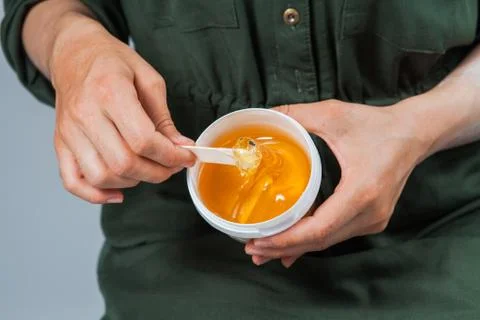 Tutorial hair removing sugaring, depilation, waxing Stockfoto's