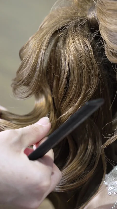 Tutorial on hair styling for beginners in a salon setting Stock Footage 336464756