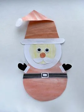 Tutorial on how to make Santa Claus out of paper, children's creativity. Stock Photos