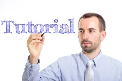 Tutorial - Young businessman writing blue text on transparent surface Foto stock