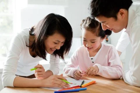 Tutoring girls to study Stock Photos
