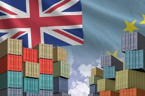 Tuvalu flag and big stack of shipping cargo containers in docks with sky Stock Photos