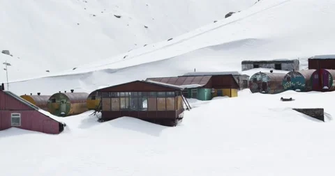 Tuyuk-Su alpine camp. Close. View of the alpine houses. Deep snow. Stock Footage 145112837