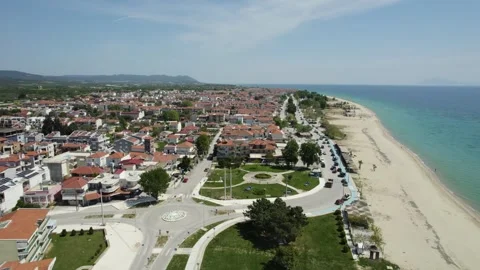 Tuzla, Ofrynio Beach, Seaside Town in Greece, Aerial Dolly Shot of Coastal Stock-Footage 309268341