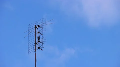 TV antenna in the background of clouds - time lapse footage. Stock Footage 155983158
