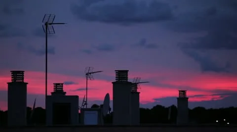 TV antenna in red sky Stock Footage