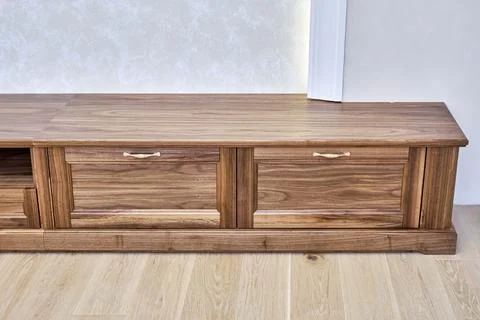 TV cabinet of veneer and solid walnut Stock-Fotos