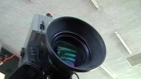 TV CAMERA + OUTSIDE BROADCAST VAN / CABLES Video stock 122281901
