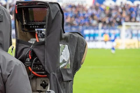 TV camera at the stadium, broadcasting during a football, soccer match 写真素材