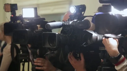 TV cameras at the press conference Stock Footage