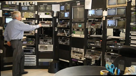 TV CONTROL ROOM MAN WORKING WITH DOLLY MOVE Stock Footage 58952543