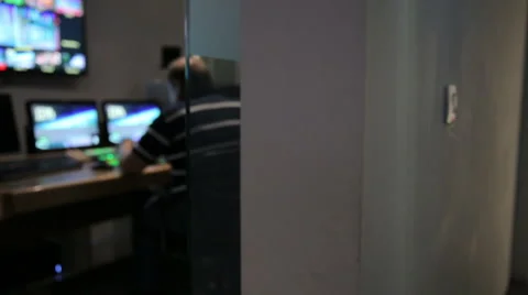 TV control room operating, our of focus track left Stock-Footage 50894717