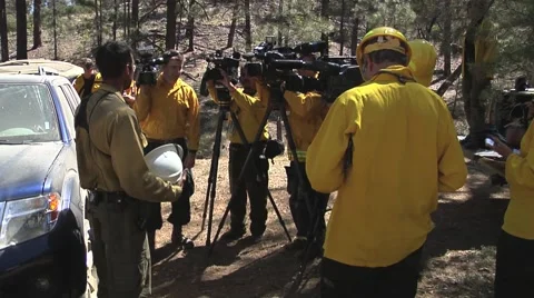 TV Crews interviewing and taking notes from fire boss Stock Footage 40955525