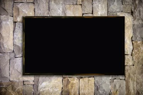 TV display on old wall Stock Photos