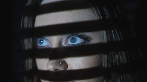 TV face. Projected line patterns on female face. Closeup on blue eyes. Stock Footage 89630131
