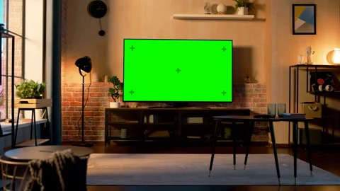 TV with Green Screen in Loft Apartment | Stock Video | Pond5