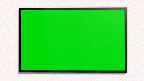TV with green screen is switched on with remote control Stock-Footage 73292593