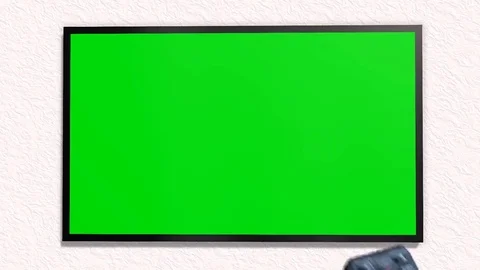 TV with green screen is switched on with remote control Stock-Footage 73292595