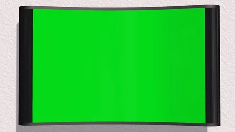 TV with green screen is switched on with remote control 스톡 동영상 73292702